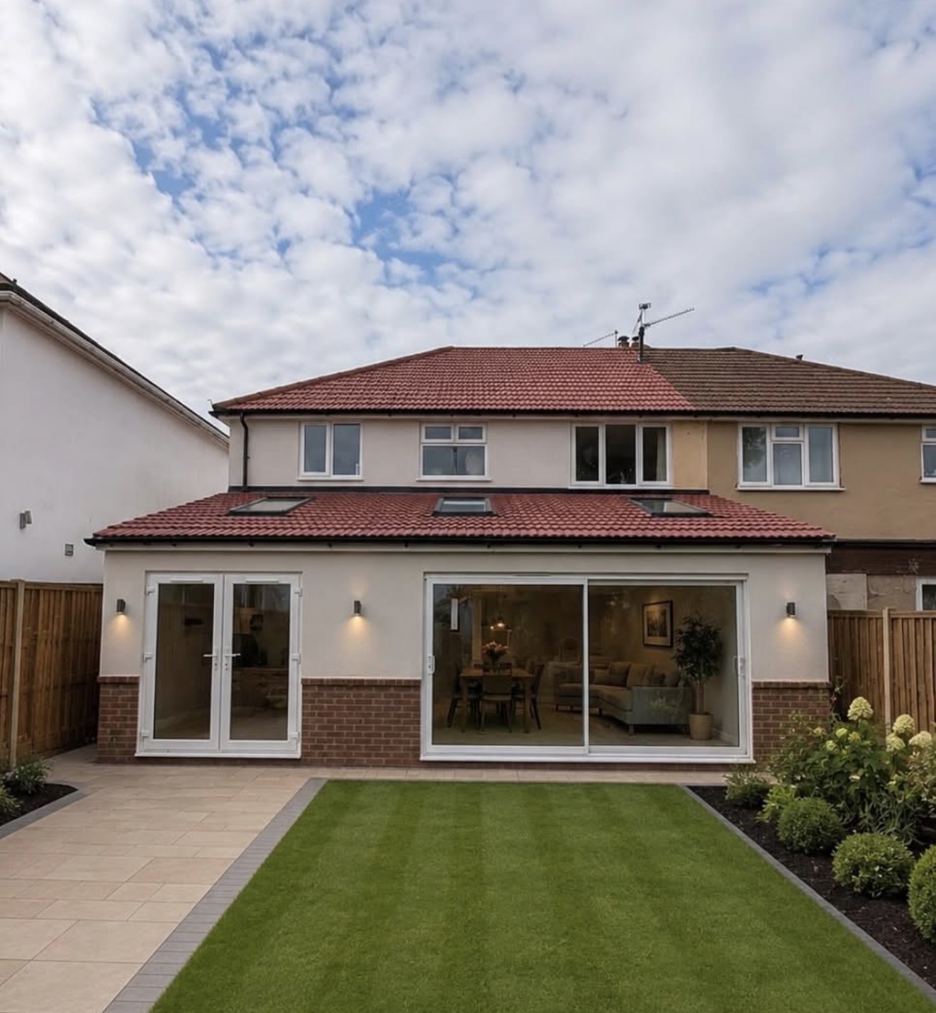 Rear extension with French doors and sliding patio doors opening to the garden