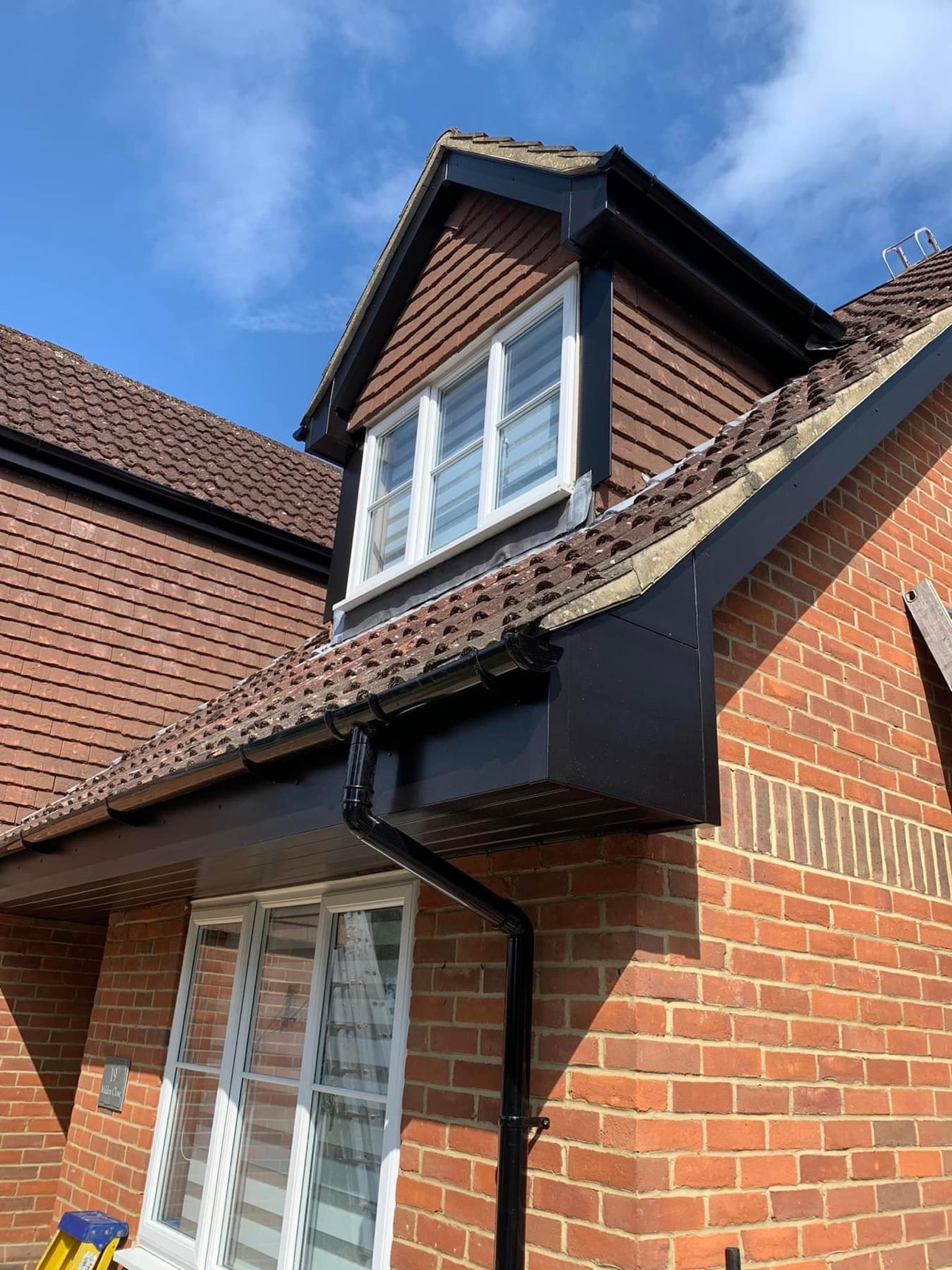 Anthracite fascia, soffit and guttering fitted to a dormer roofline